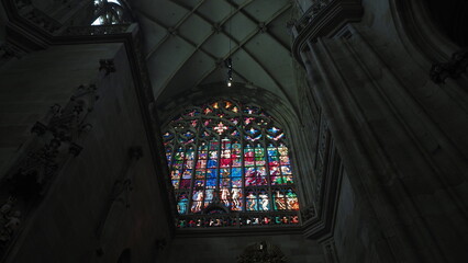 A colorful stained glass window at the cathedral of saint vitus, prague, czech republic	