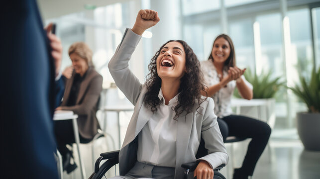 Businesswoman on the wheelchair high five with friends in the modern white office in America