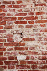 Old red brick wall background or texture