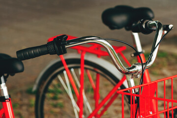 Fototapeta na wymiar Closeup of red bicycle handlebars and grips