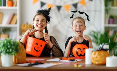 Happy family preparing for Halloween.