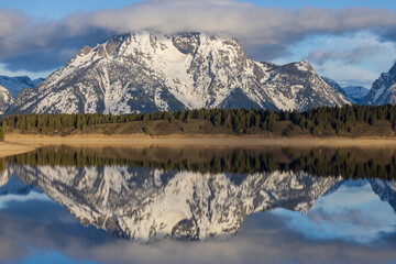 Fototapeta na wymiar Scenic Reflection Landscape of the Teton Range in Jackson Lake in Spring