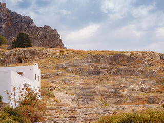 Views of Acropolis of Lindos and Temple of Athena Lindia near town of Lindos on island of Rhodes,...