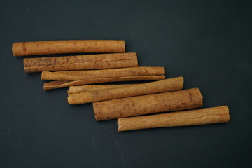 Cinnamon barks on black background