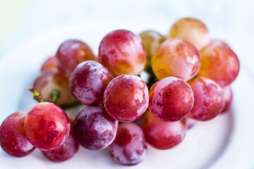 red grapes on a plate