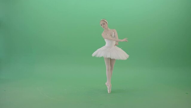 Prima ballerina ballet girl elegant dancing and spinning on green screen 4K Video Footage