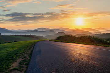 A road in a mountainous area. Beautiful mountain landscape