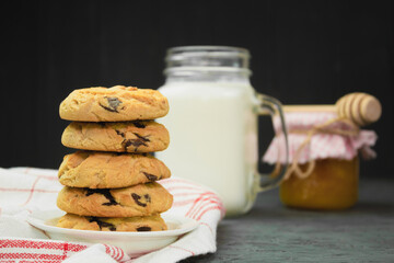 Homemade chocolate chip cookies, Cookies and a jug of milk