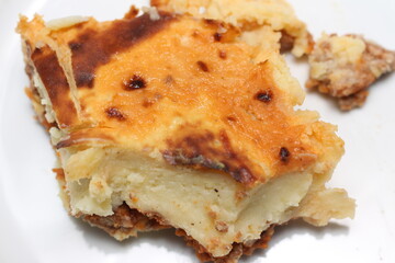 food known as Madalena, made from potatoes and ground beef. food with selective focus. homemade food.