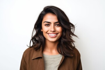 Obraz premium Medium shot portrait of an Indian woman in her 20s against a white background