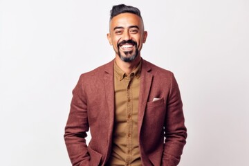Obraz premium Medium shot portrait of an Indian man in his 30s against a white background