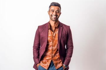 Obraz premium Lifestyle portrait of an Indian man in his 30s against a white background