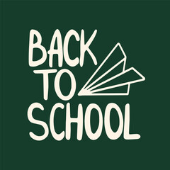 Back to school. Handwritten inscription. A paper airplane. School topics