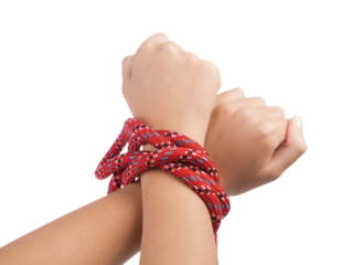 a girl with her hands tied by a rope