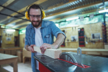 Handsome carpenter working