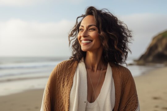 Medium Shot Portrait Of An Indian Woman In Her 40s In A Beach 