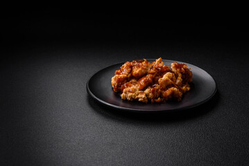 Delicious juicy grilled chicken meat bites with salt, spices and herbs