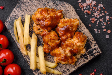 Delicious juicy grilled chicken meat bites with salt, spices and herbs