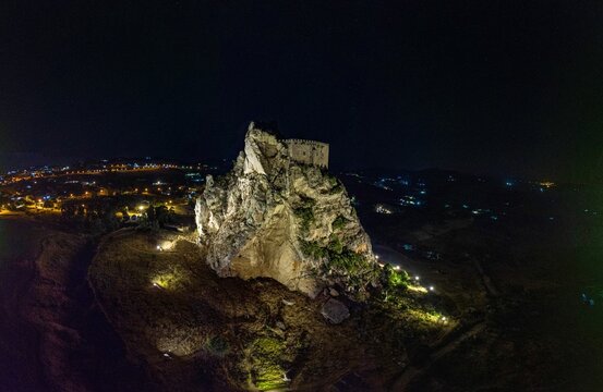 Mesmerizing night drone shot of the Mussomeli Castle