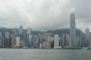 Naklejka premium Beautiful shot of the cityscape of Hong Kong on a foggy day