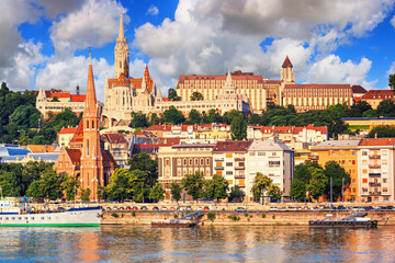 City summer landscape - view of the Buda Castle, palace complex on Castle Hill with Matthias Church...