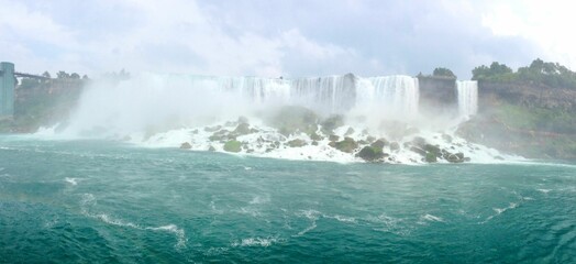 Spectacular view of picturesque Niagara Falls cascading down the side of a mountain in the USA