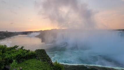 Scenic view of Niagara Falls in Canada at golden sunrise