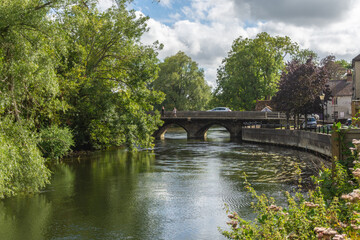 Fototapeta na wymiar Fordingbridge, UK - August 19th 2023: The Great Bridge crossing over the River Avon.