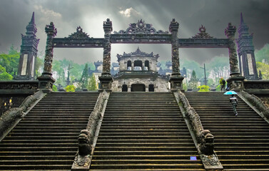 Mystic atmosphere on rainy day at old vietnamese mausoleum tomb of emperor Khai Dinh, stairway to...