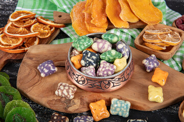 Milk chocolate candies in shell with jelly sugar gums and liquorice allsorts and fruit sherbet...