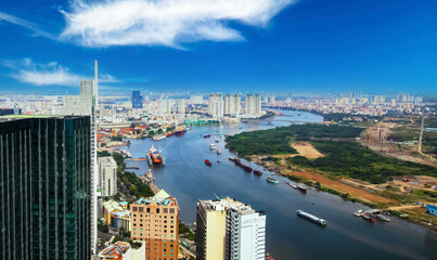 Ho Chi Minh City, Vietnam - December 9. 2015: Skyline view from bitexo tower of vietnamese capitol with river Saigon, skyscrapers