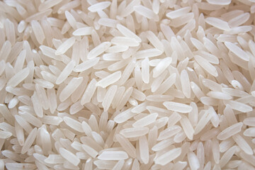 grains of uncooked white rice texture background