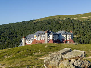 mountain hotel in summer , A summer day in Uludag , stylish mountain hotel built in front of pine...