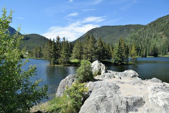Peaceful Colorado Lake Fronted by Boulder