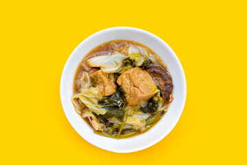 Mixed vegetable stew wih tofu in white bowl (Tom Jub Chai)