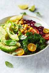 Colorful vegetable bowl with bulgur and chickpeas. Close-up. Healthy lifestyle diet