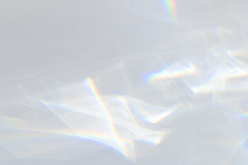  Crystal prism rainbow light refraction texture on white wall background. Organic drop diagonal holographic flare on a white wall. Water shadows for natural light overlay effects - 637128400
