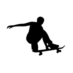 Silhouette of a skateboarder mid-jump