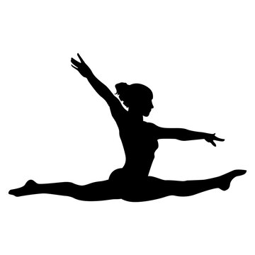 Silhouette of a gymnast jumping in the splits