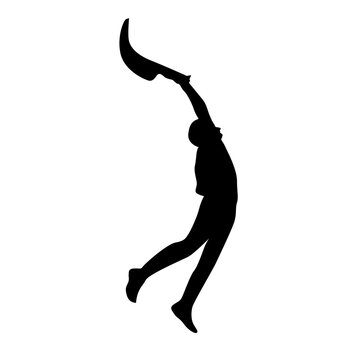Silhouette of a person playing jai alai