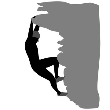Silhouette of a rock climber hanging from an outcropping