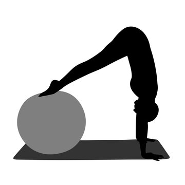 Silhouette of a person doing PIlates