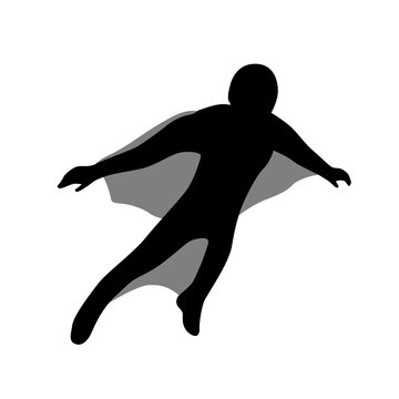 Silhouette of a person using a wingsuit