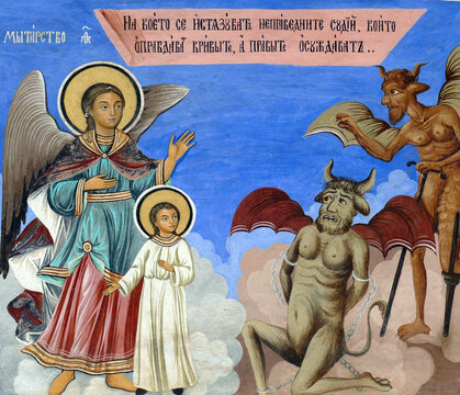 Fresco of guardian angel protecting against the temptations of demons