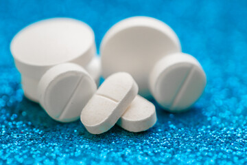 Medicines and preparations.Medical background.Tablets and pills medical white set on blue...