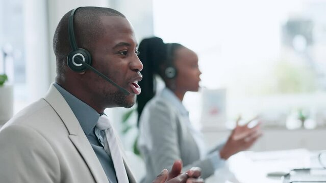 Call center, telemarketing and male consultant in the office doing an online consultation. Contact us, crm and young African man customer service agent working on a hotline with headset in workplace.