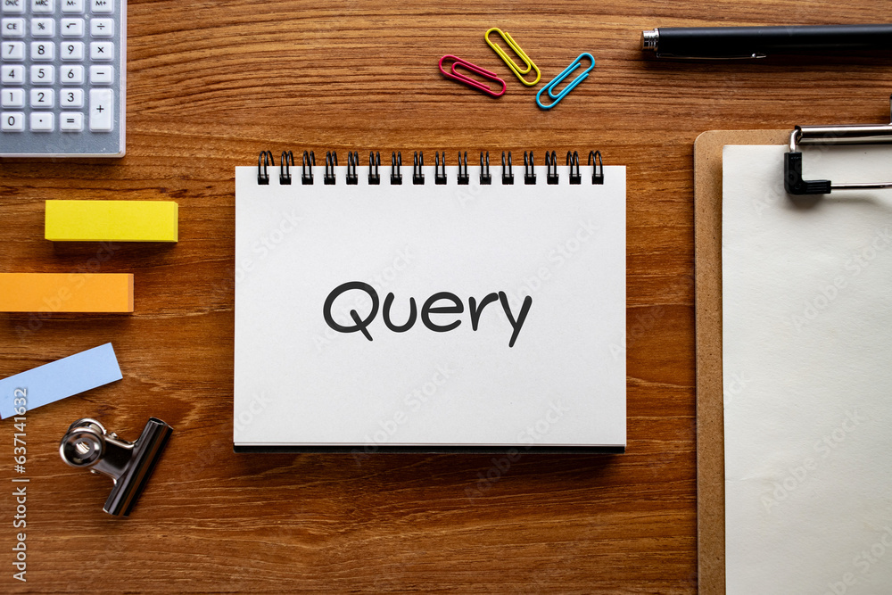 Poster there is wood cube with the word query. it is as an eye-catching image.