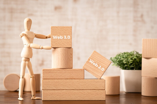 There is wood cube with the word Web3.0 or Web2.0. It is an abbreviation for Web3.0 or Web2.0 as eye-catching image.