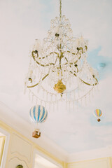 A chandelier hanging from the ceiling 