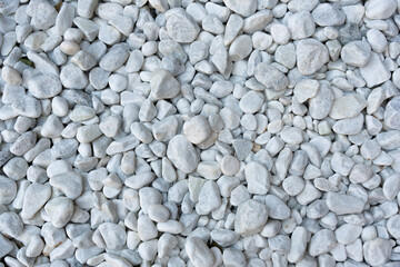 natural gray River Rock Pebbles stone Background.
